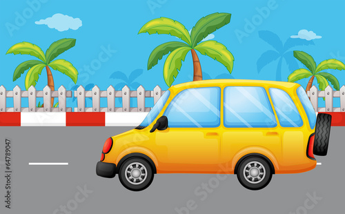 A yellow van at the road