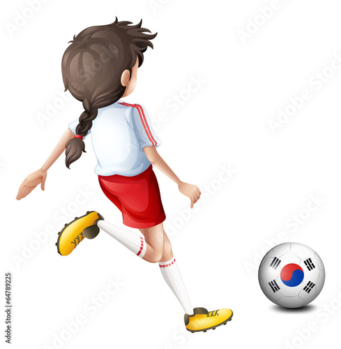 A girl kicking the ball with the South Korean flag