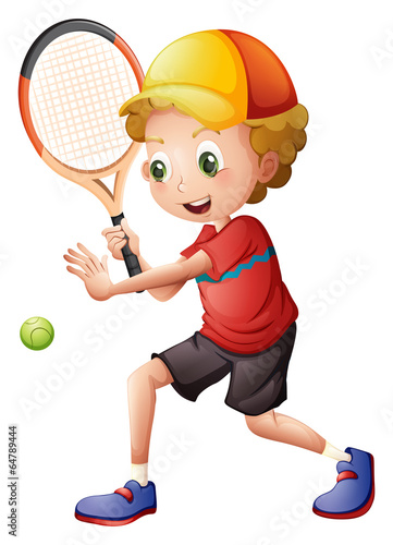 A cute little boy playing tennis