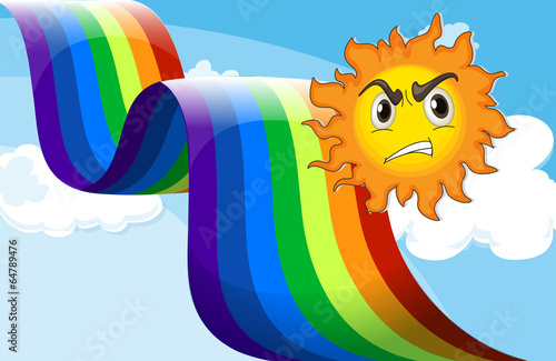 A sun frowning near the rainbow