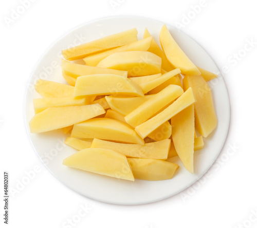 Chopped raw potato in plate isolated