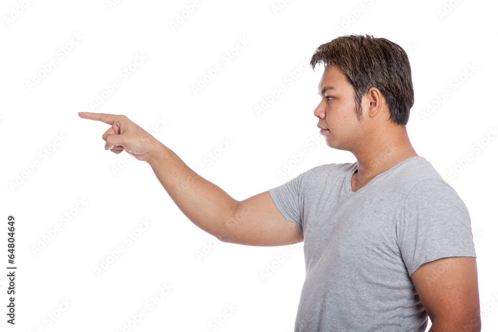 Side view of Asian strong man pointing wear casual dress Side view of Asian strong man pointing wear casual dress