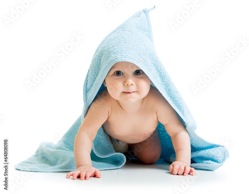 Funny baby boy in blue towel photo