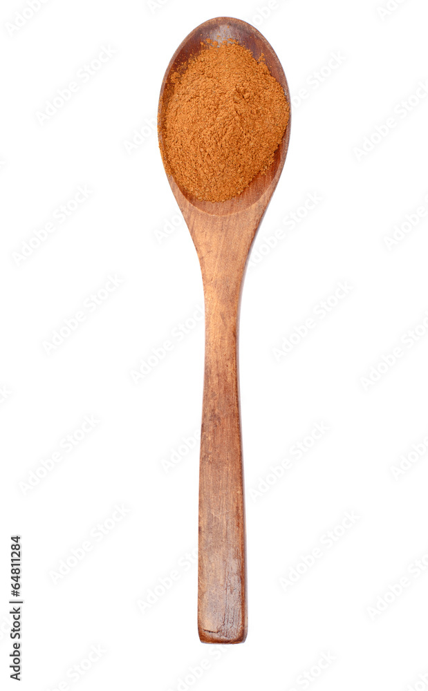 Orange Spice in Wooden Spoon Isolated on White Background Orange Spice in Wooden Spoon Isolated on White Background
