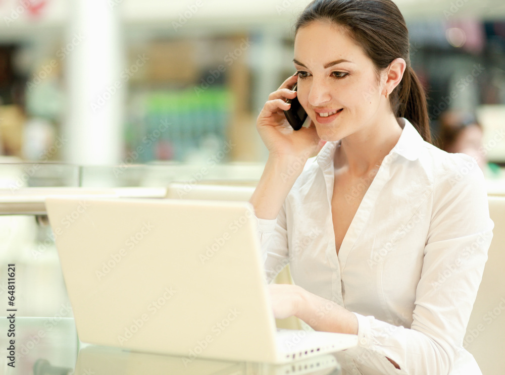 Portrait of a smiling businesswoman with phone Portrait of a smiling businesswoman with phone