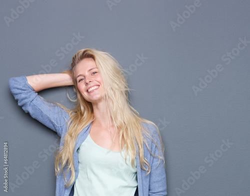 Portrait of a happy smiling young blond woman