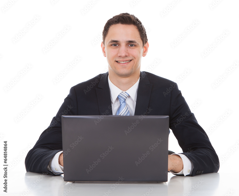 Confident Businessman Standing With Hands In Pockets Confident Businessman Standing With Hands In Pockets