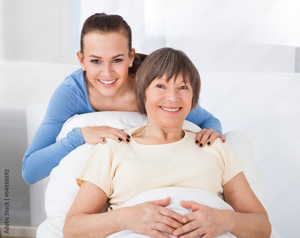 Portrait Of Happy Caregiver With Senior Woman Portrait Of Happy Caregiver With Senior Woman