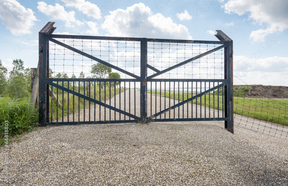 Iron gate on a Dutch dike