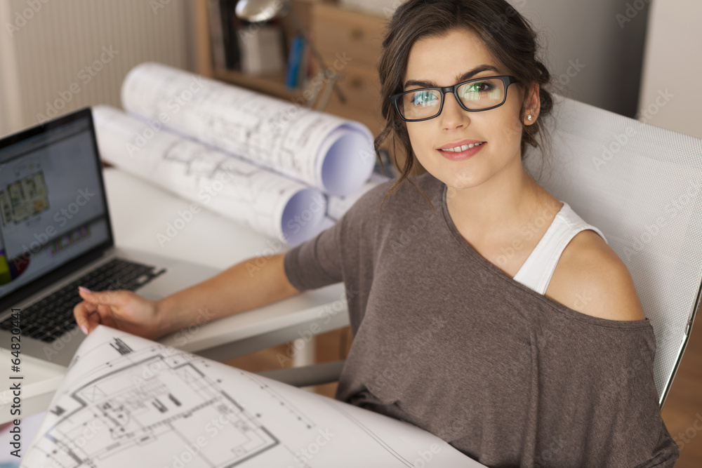 Young architect working in home office Young architect working in home office