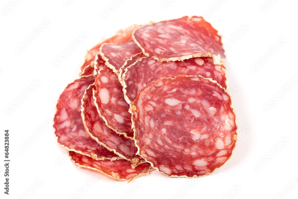 Slices of salami sausage on a white background Slices of salami sausage on a white background