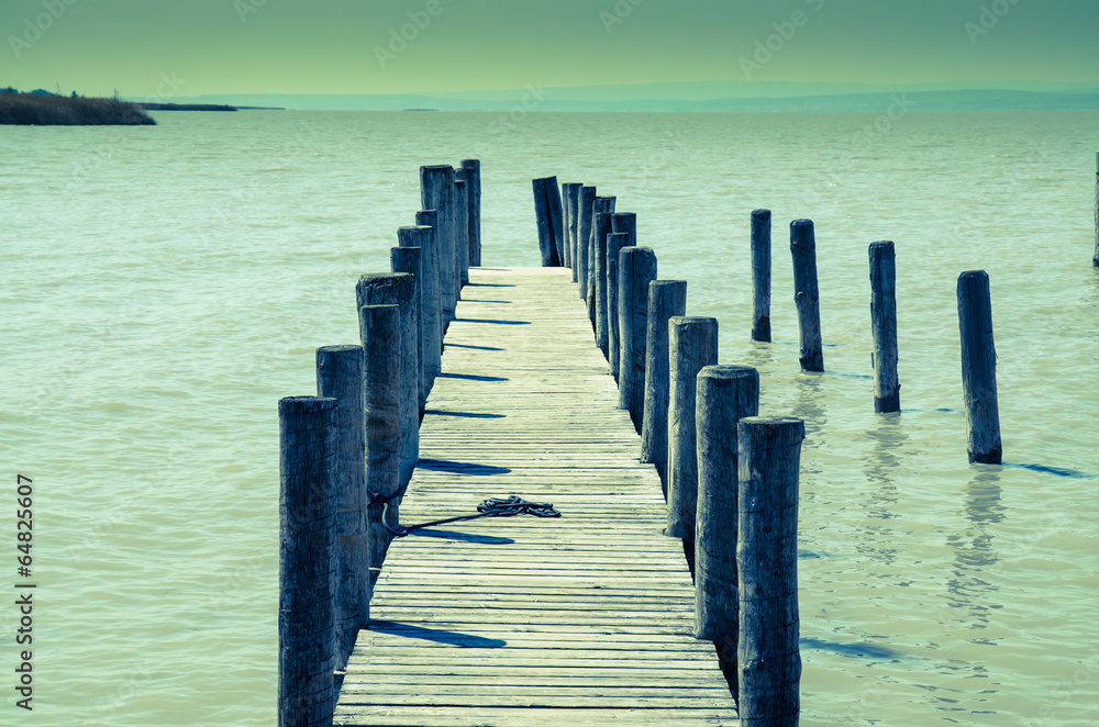 Fototapeta premium wooden bridgwe in the water