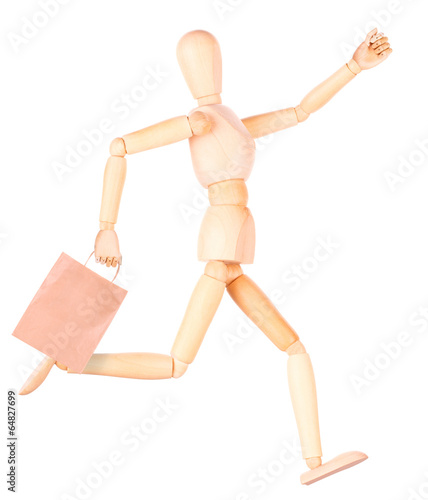 happy wooden Dummy with shopping bags