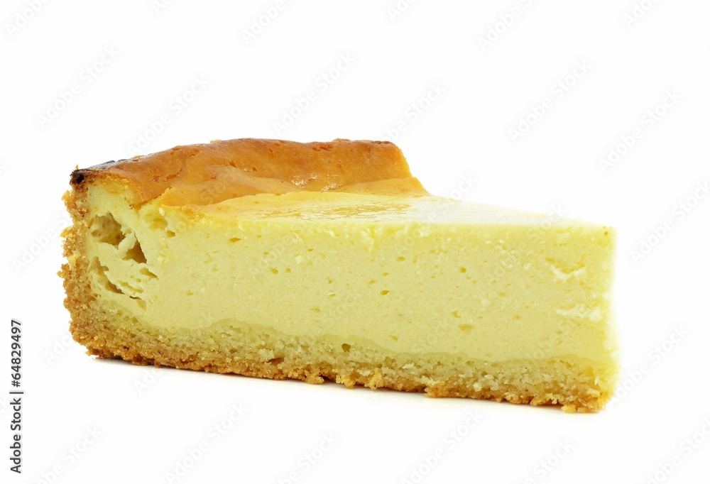A triangle slice of plain cheese cake on a white background