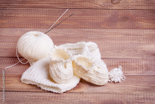 Knitting of white thread and balls