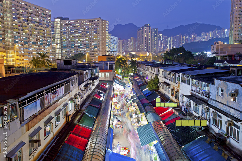 Local market under Lion Rock Hill in Hong Kong. It shows Hong Ko