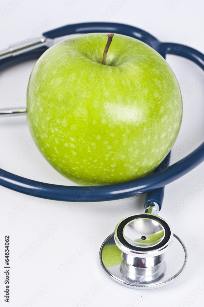 stethoscope and apple isolated on white background stethoscope and apple isolated on white background