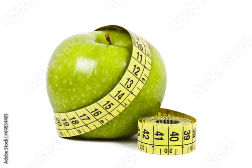 apple and measuring tape isolated on white background