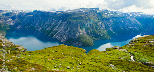 Fototapeta Naklejka Na Ścianę i Meble -  Norway Mountain Vibrant Landscape Trolltunga Odda Fjord Norge Hi