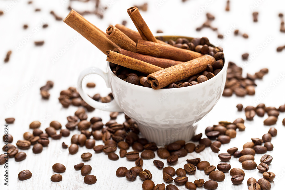 Cinnamon sticks and coffee beans Cinnamon sticks and coffee beans