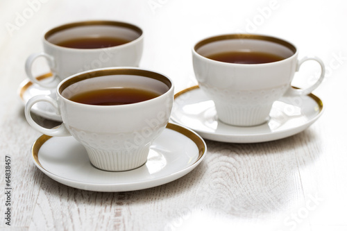 Cups with tea or coffee