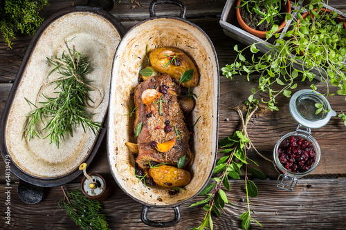 Bild auf Leinwand Roasted venison with herbs and vegetables