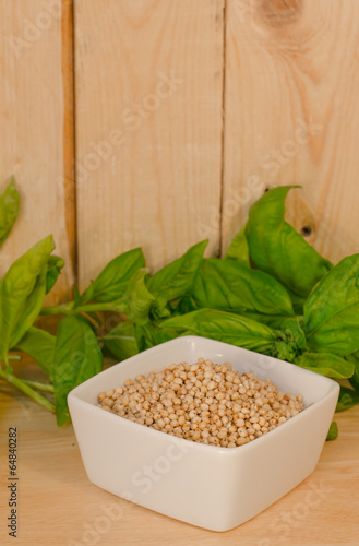bowl with sorghum with basil photo