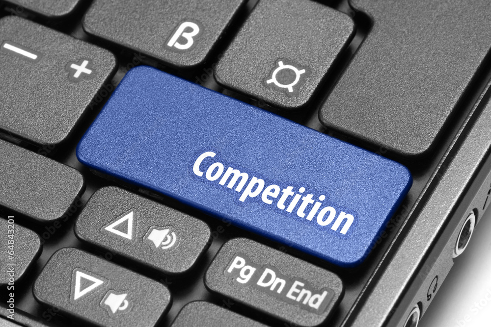 Competition. Blue hot key on computer keyboard Competition. Blue hot key on computer keyboard