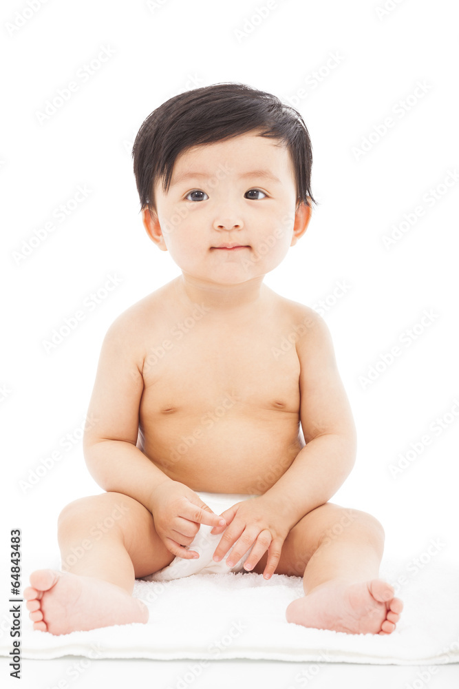 Infant child baby sitting on a white background Infant child baby sitting on a white background