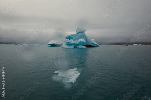 Beatiful vibrant picture of icelandic glacier and glacier lagoon photo