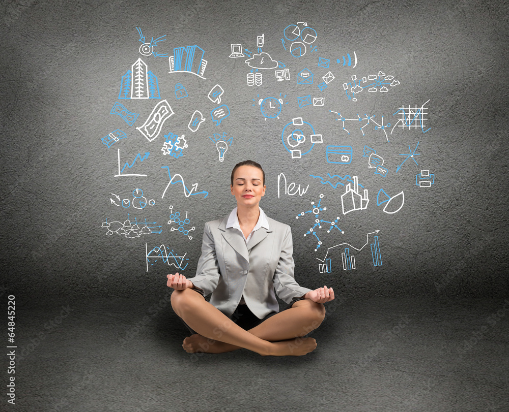 business woman meditating on floor business woman meditating on floor