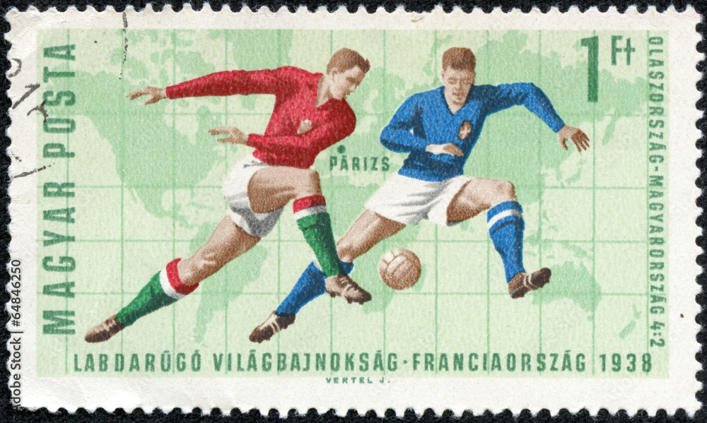 stamp showing illustration of soccer players