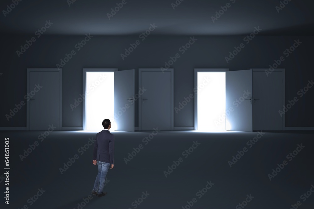 Obraz premium Composite image of casual businessman walking