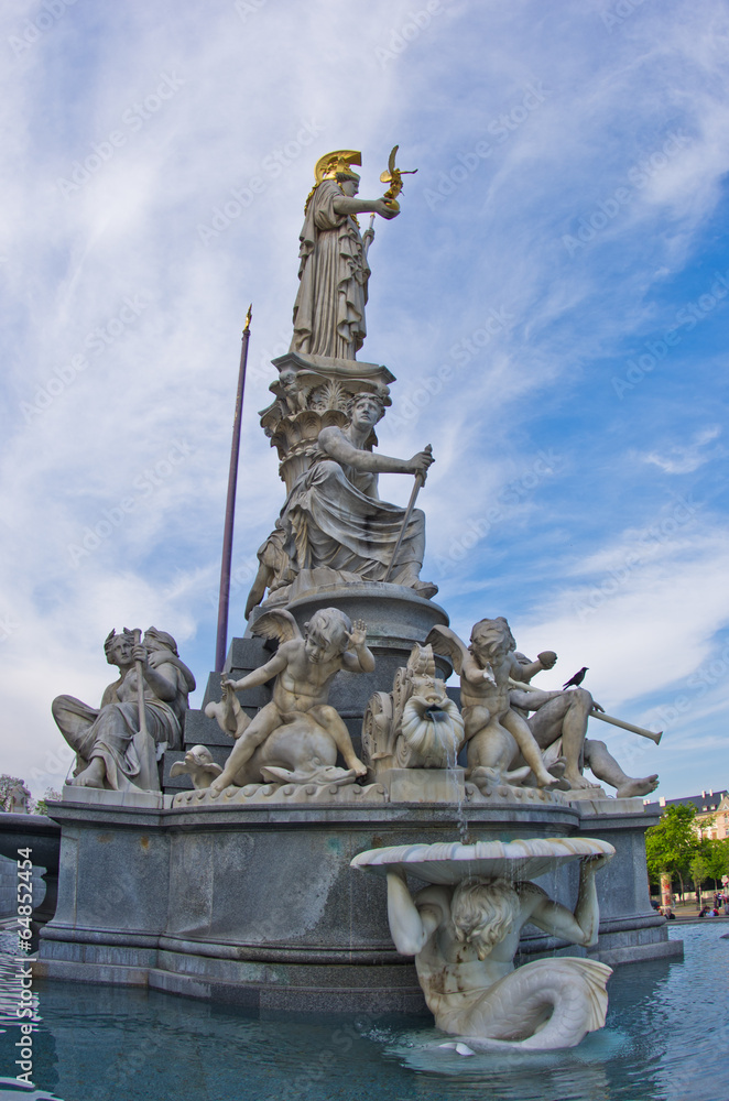 Fototapeta premium Pallas Athene fountain at front of Austrian Parlament, Vienna