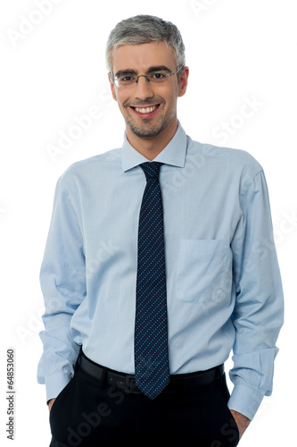 Relaxed young smiling business man