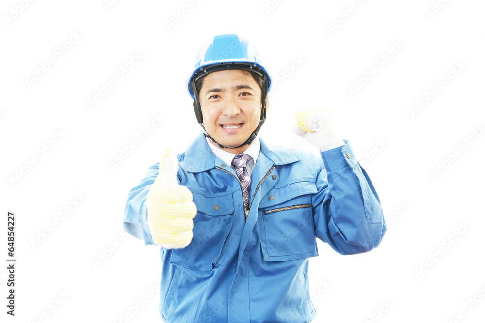 ガッツポーズの作業員