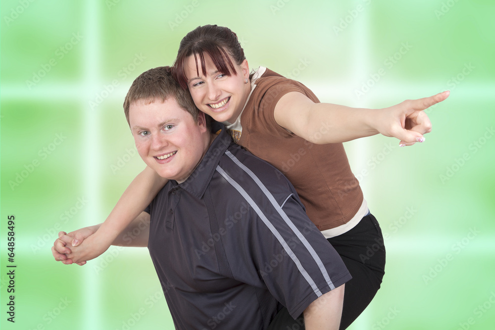 Obraz premium Man carrying woman piggyback