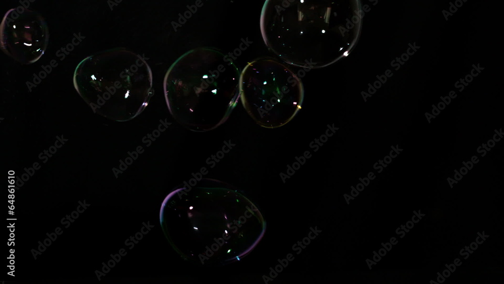 Bubbles floating on black background