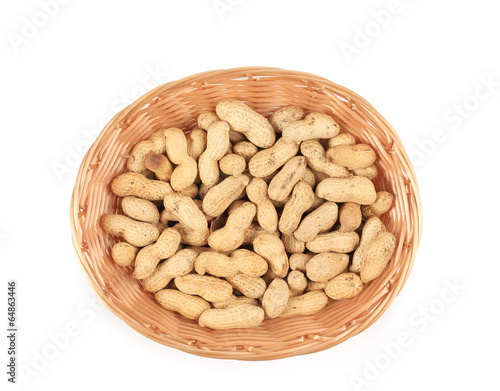 Basket full with peanuts.