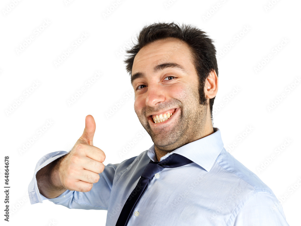 Happy young businessman showing thumb up gesture Happy young businessman showing thumb up gesture