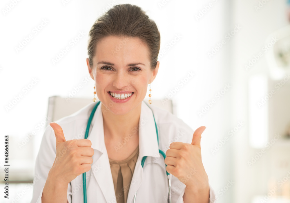 Medical doctor woman showing thumbs up Medical doctor woman showing thumbs up