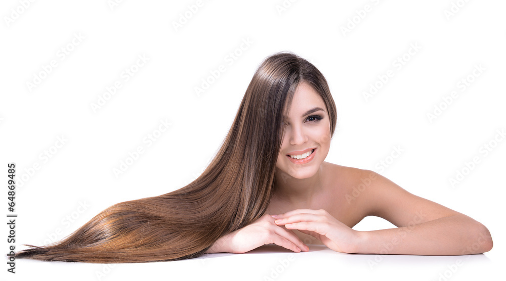 Obraz premium Beautiful young woman with long hair isolated on white