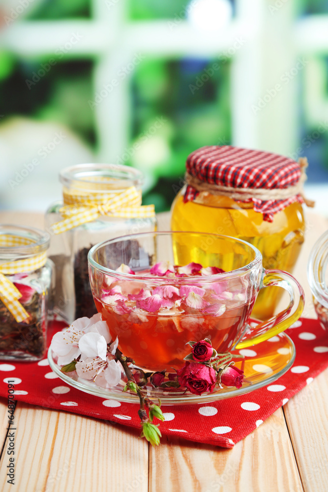 Assortment of herbs, honey and tea in glass jars Assortment of herbs, honey and tea in glass jars