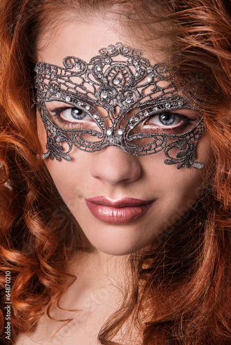 Beautiful Girl in a Carnival mask. Masquerade