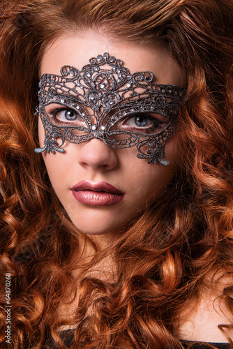 Beautiful Girl in a Carnival mask. Masquerade