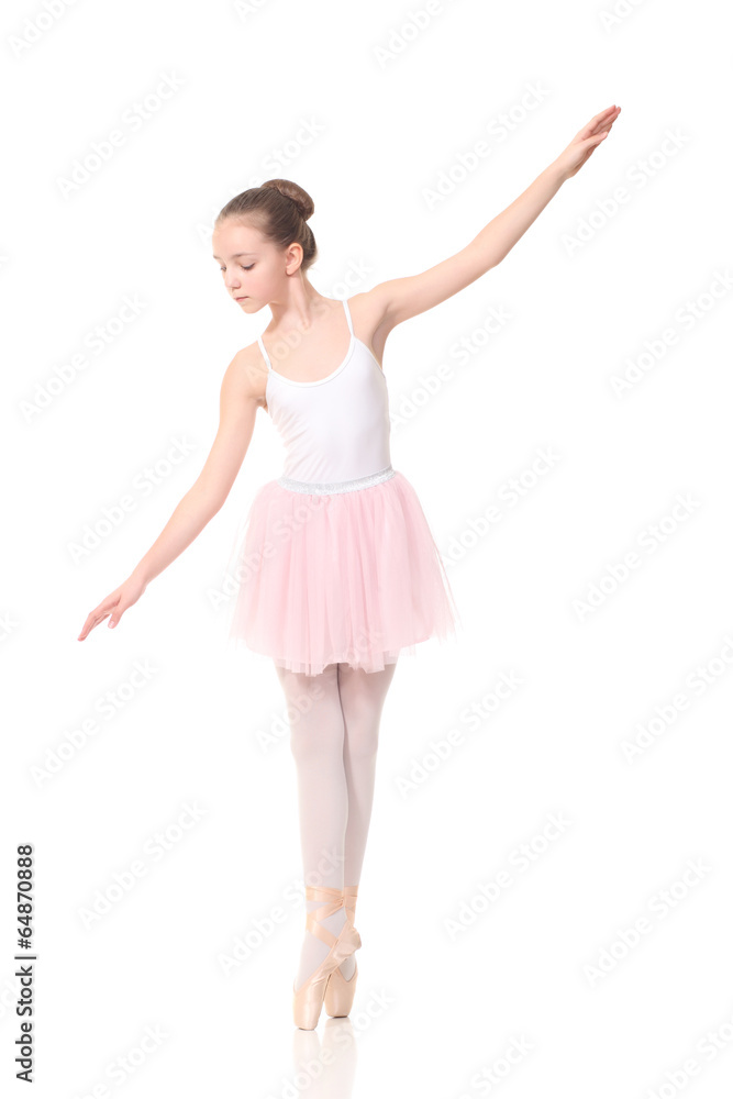 young beautiful dancer posing on a studio background young beautiful dancer posing on a studio background
