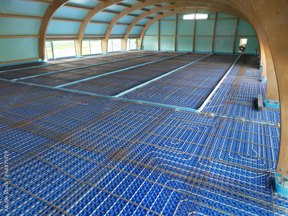 Fototapeta premium Cantiere con installazione di riscaldamento a pavimento
