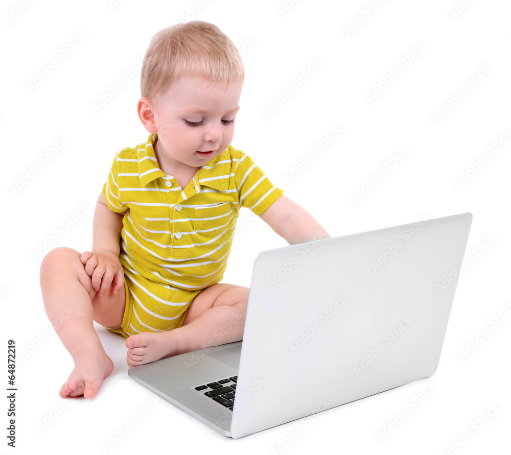Cute little boy with laptop isolated on white Cute little boy with laptop isolated on white