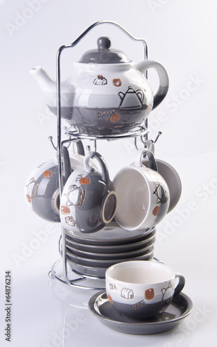 tea pot set, Porcelain tea pot and cup on white background photo