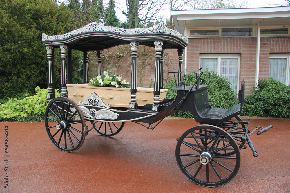 Classic funeral carriage with coffin